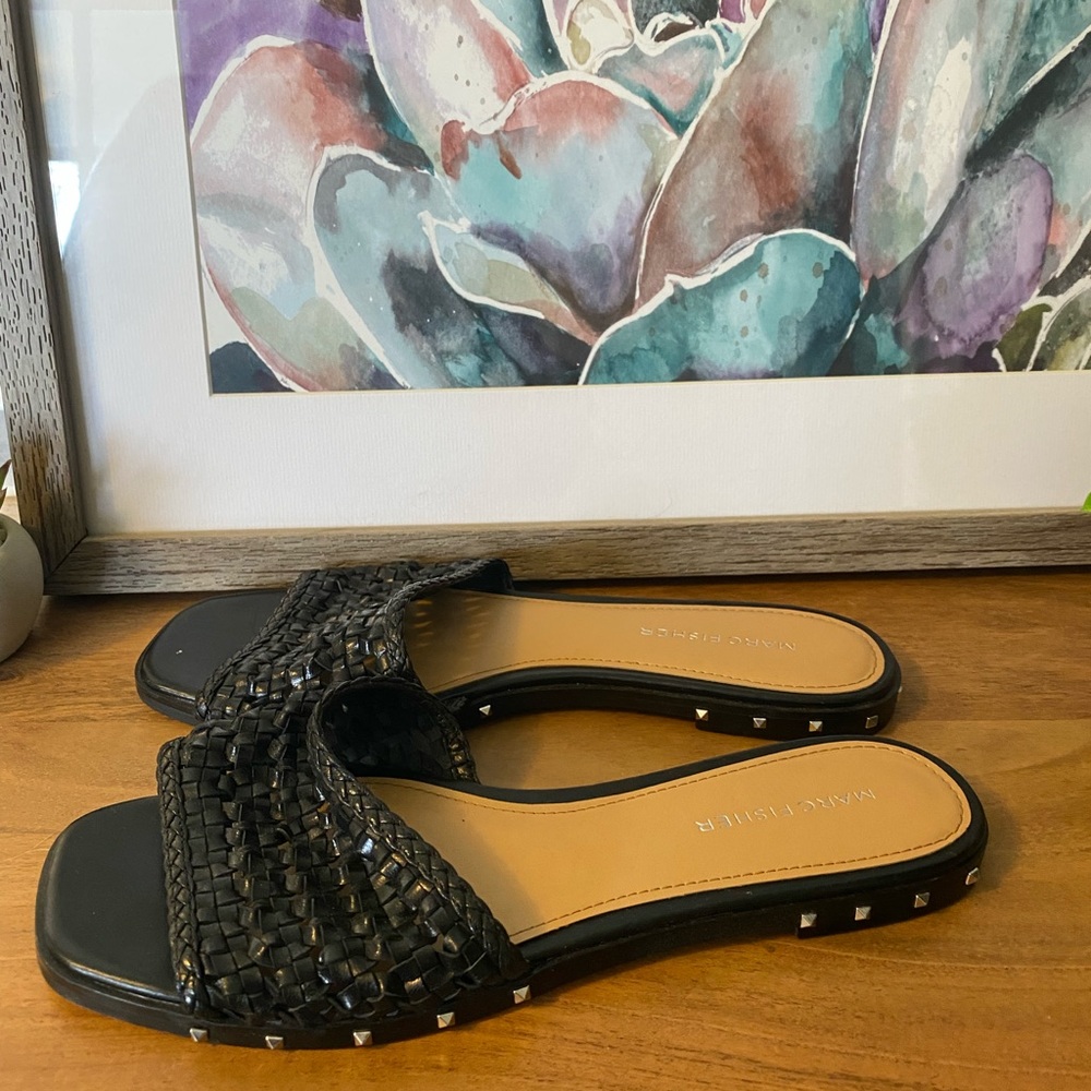 Marc fisher slip on flats. Only wore these a few times. In good condition